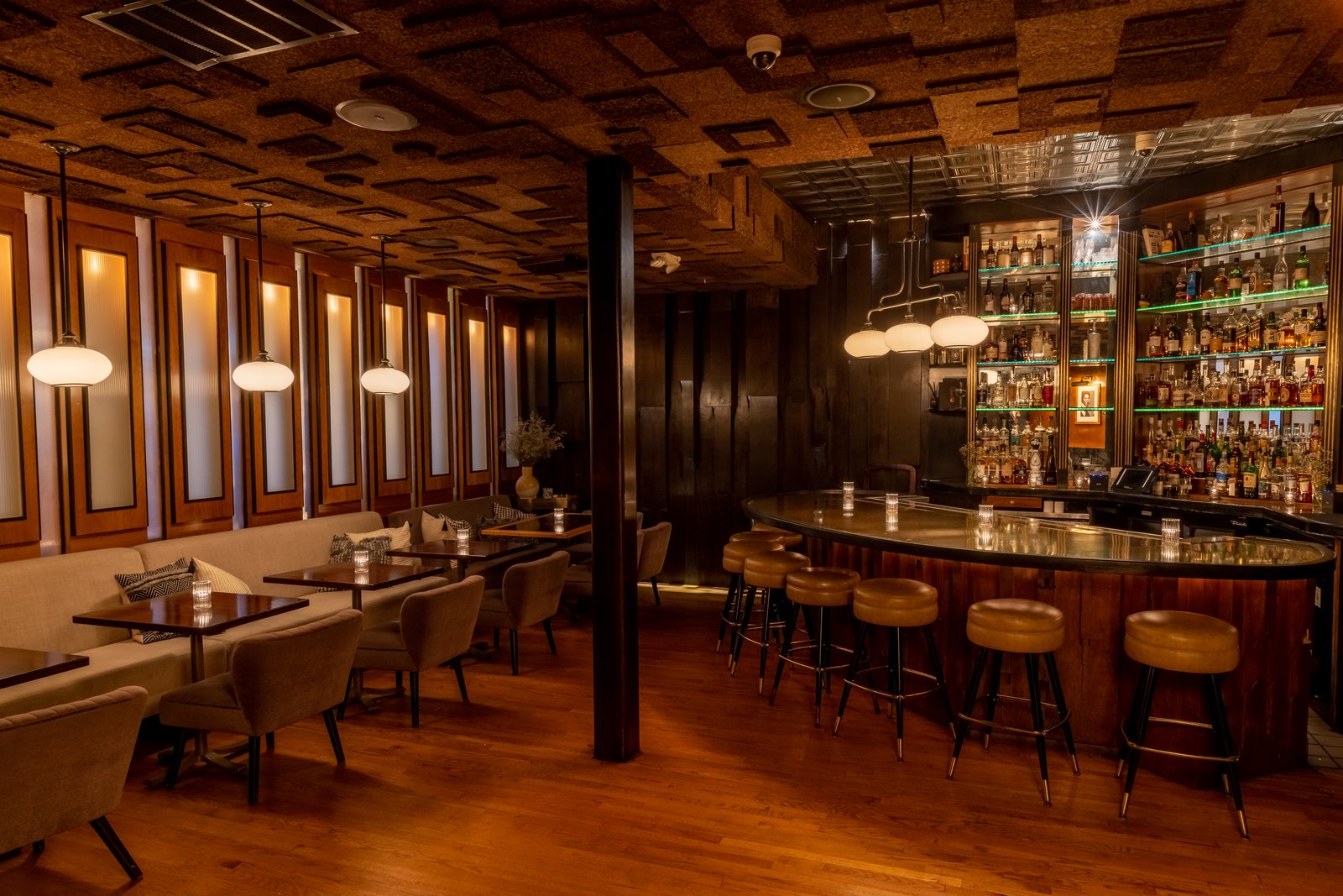 Employees Only LA curved Art Deco bar interior with warm lighting, West Hollywood