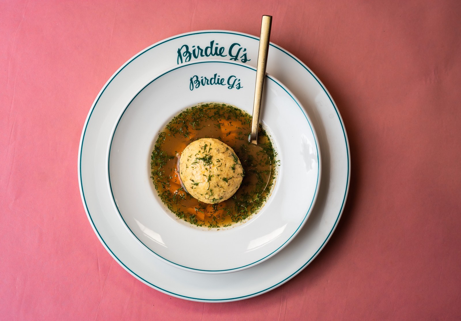 Birdie G’s matzo ball soup on pink background, Santa Monica Bergamot era
