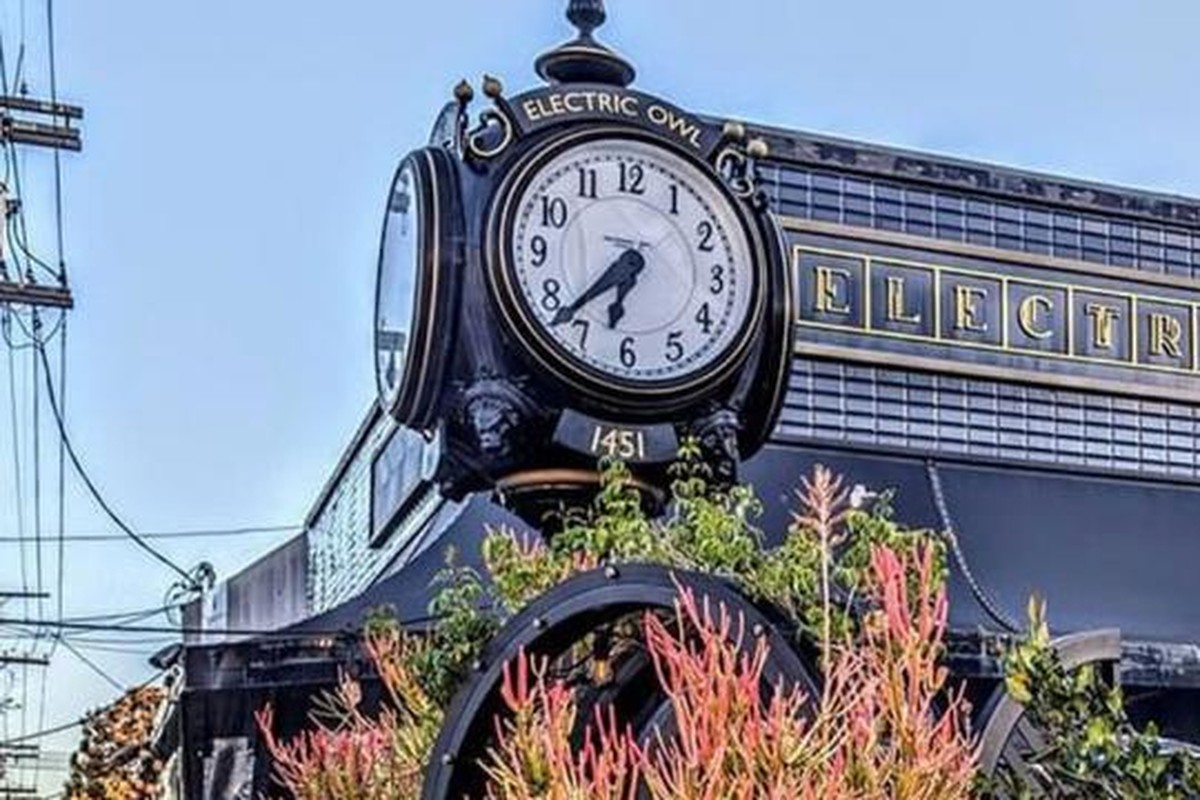 Electric Owl exterior street clock and entrance at 1451 N Gardner Street