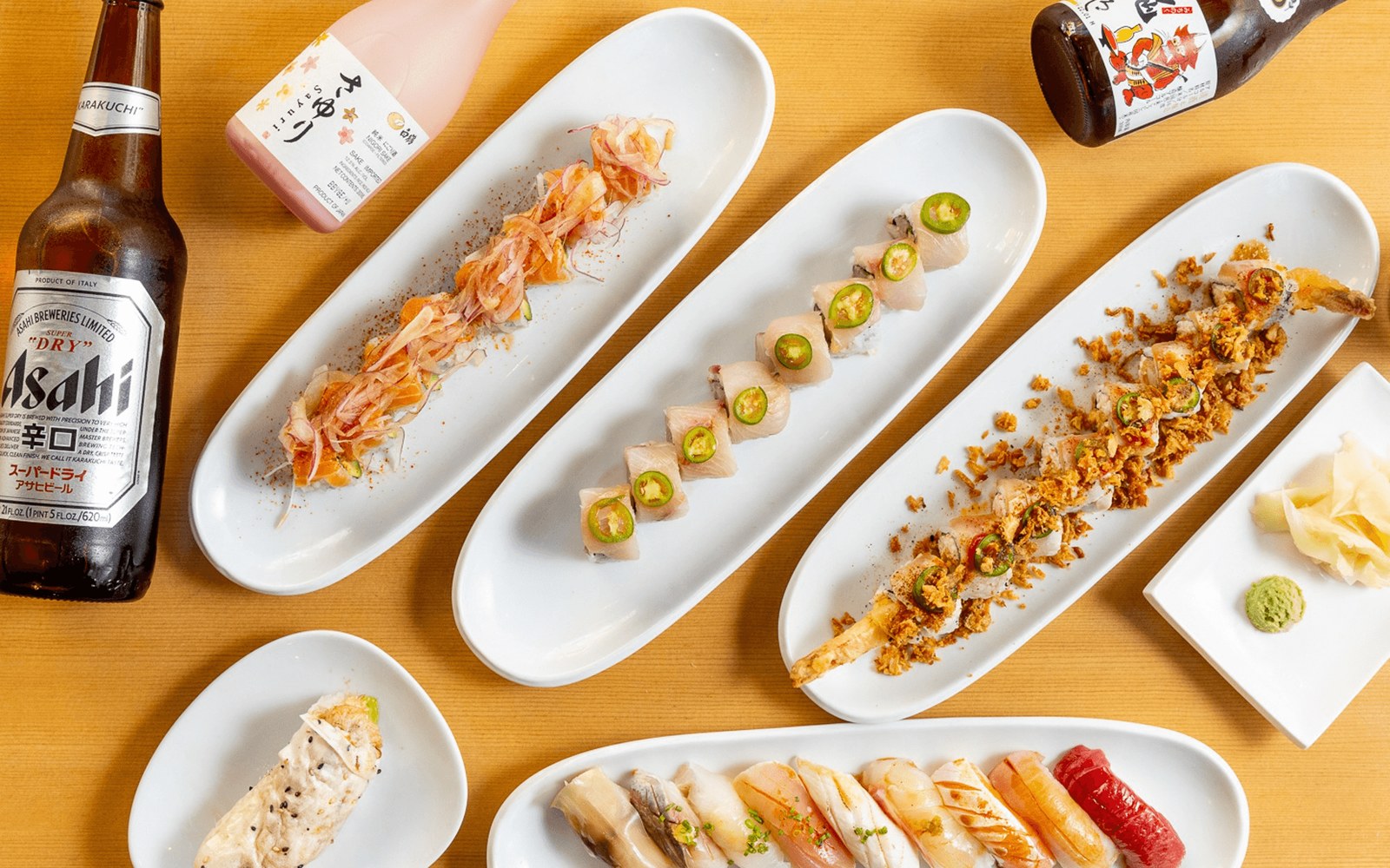 Sushi platters and sake at Kombu Sushi Arts District