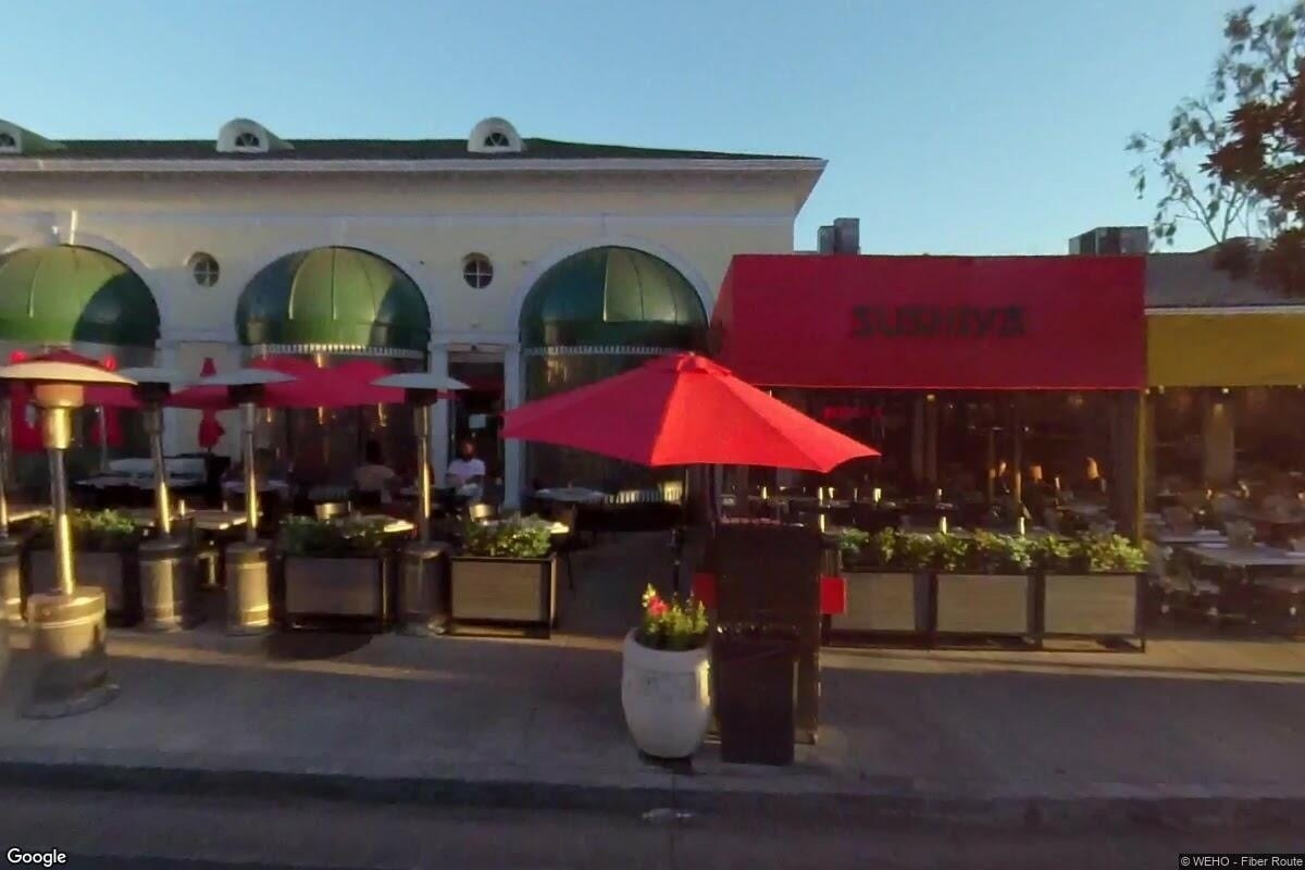 Sushiya exterior on Sunset Plaza with red awning and patio seating, West Hollywood