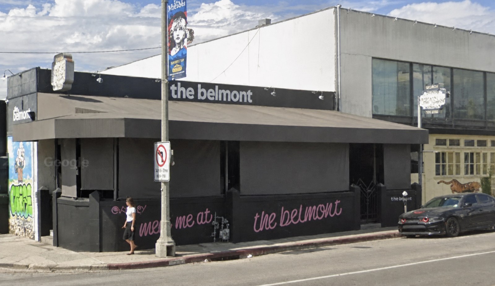 The Belmont exterior on La Cienega with meet me at the belmont mural