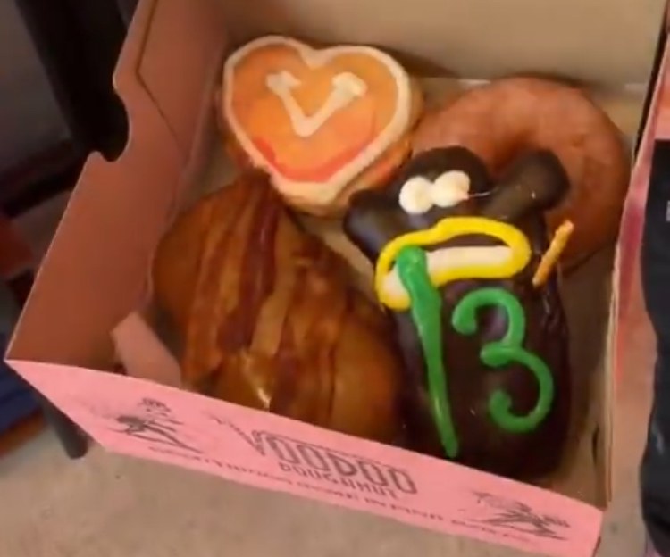 Voodoo Doughnut pink box with signature doughnuts from the Venice Windward shop
